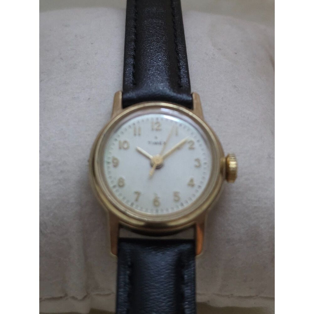 Vintage Timex Ladies Manual Wind Gold Tone Watch White Dial Black Strap